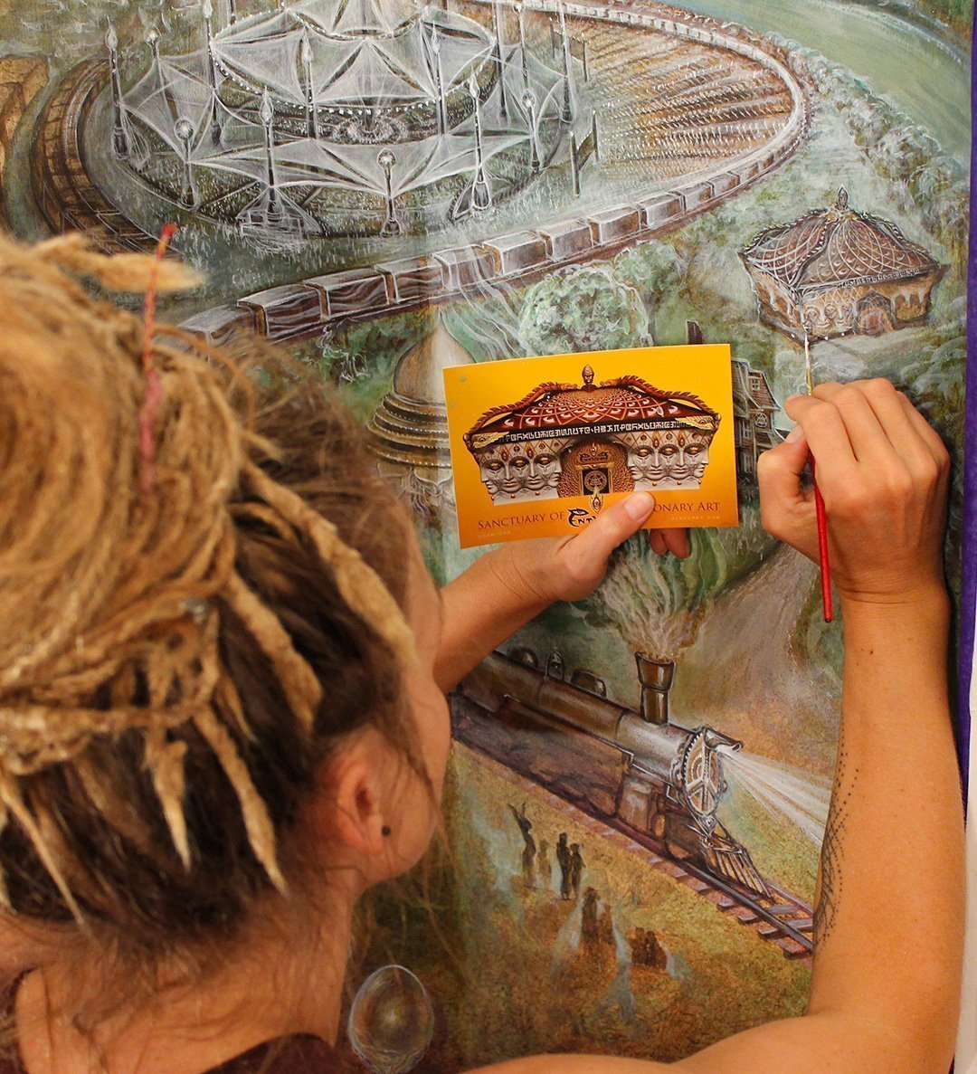 Amanda Sage painting Mushroom Cafe mural